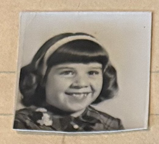 School photo taped to letter L09
