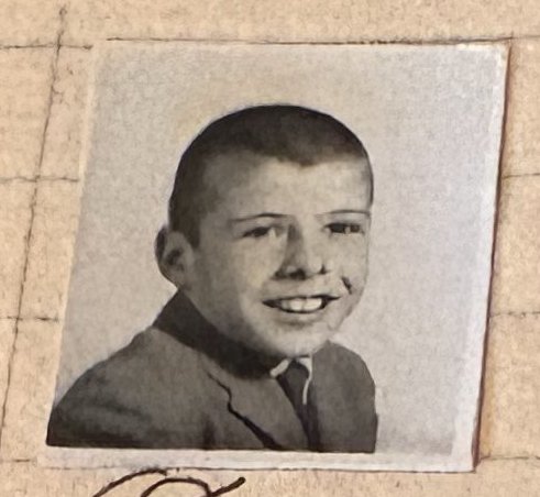 School photo taped to letter L11