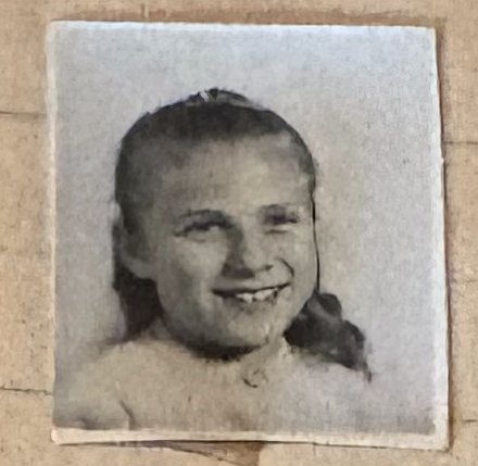 School photo taped to letter L12