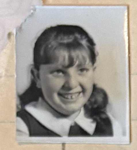 School photo taped to letter L13