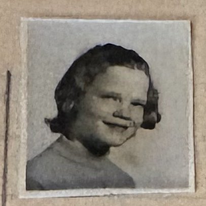 School photo taped to letter L14