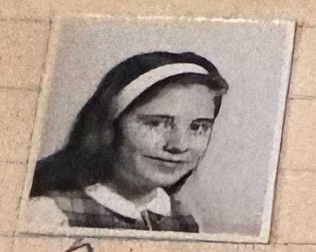 School photo taped to letter L18