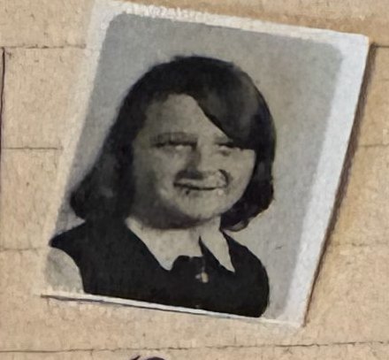 School photo taped to letter L19