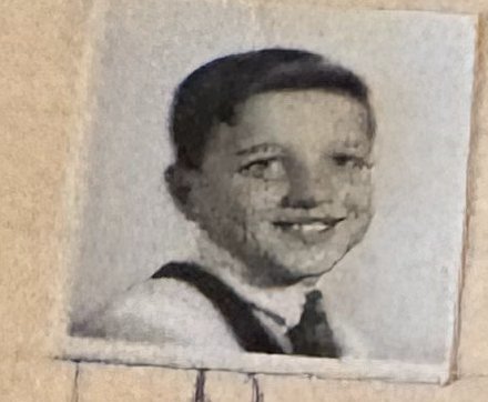 School photo taped to letter L21
