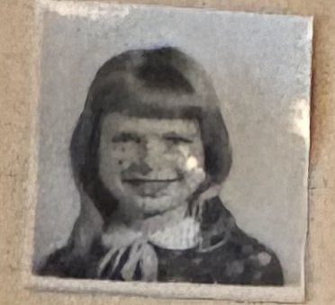 School photo taped to letter L22