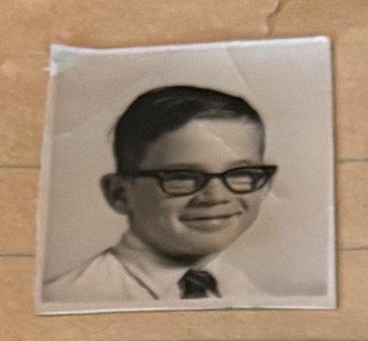 School photo taped to letter L27