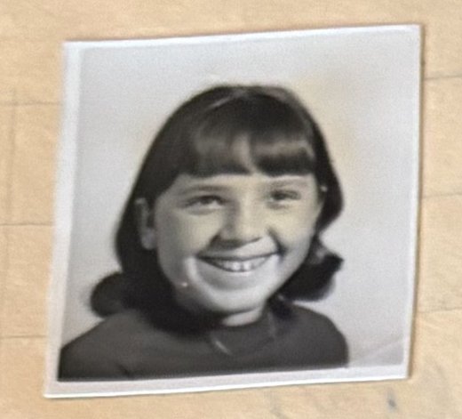 School photo taped to letter L34